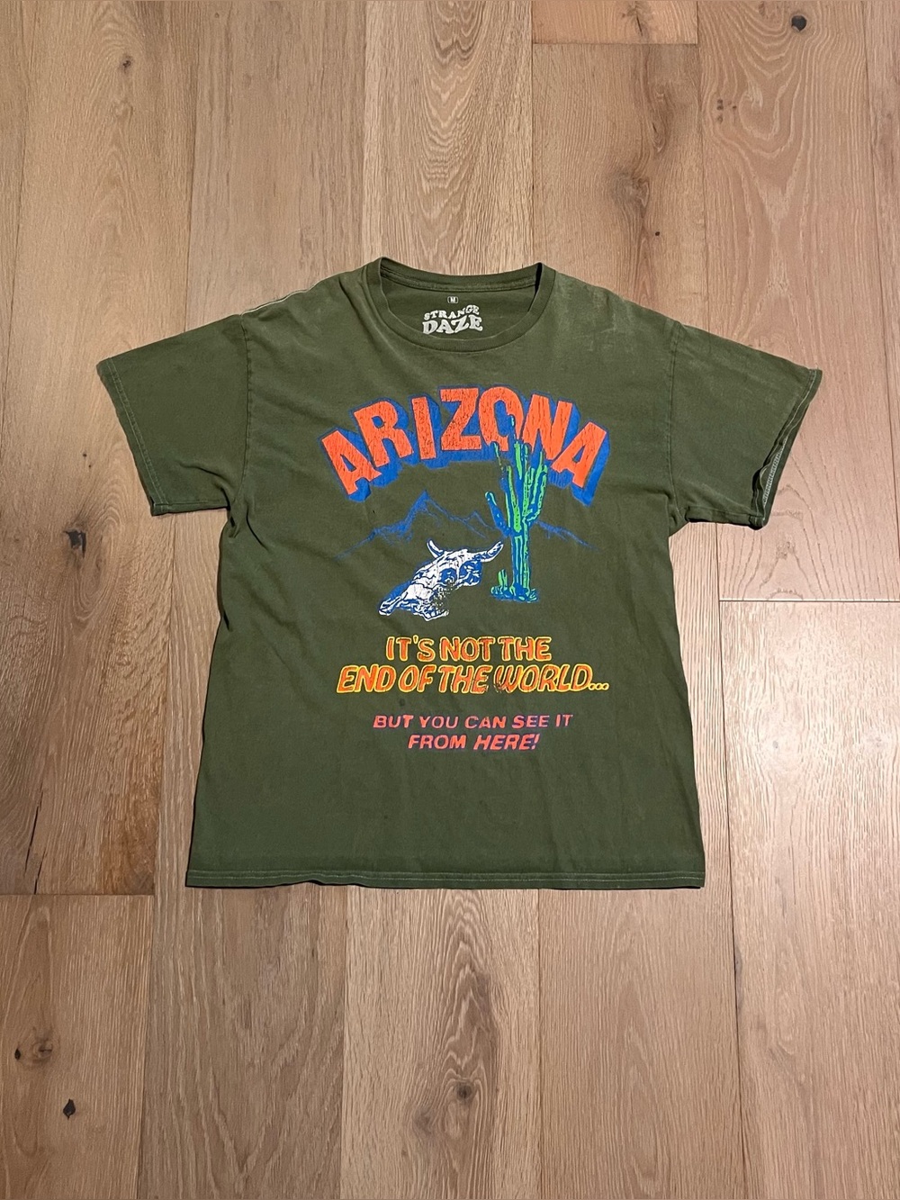 Strange daze green distressed Arizona graphic and white stitching tee